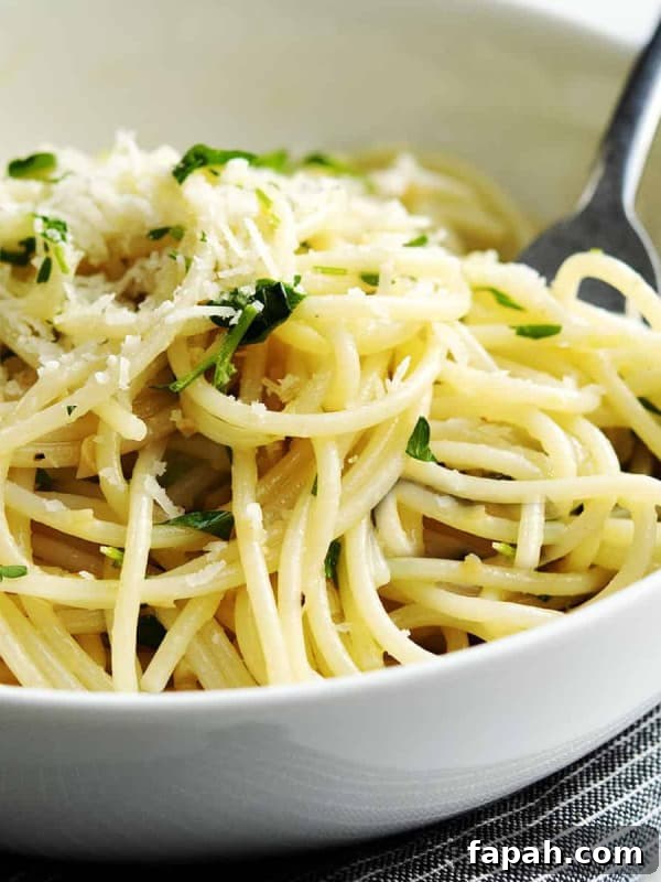 lemon garlic pasta served in a white bowl