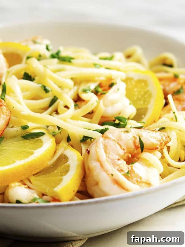 Lemon Garlic Shrimp Pasta served in a white bowl