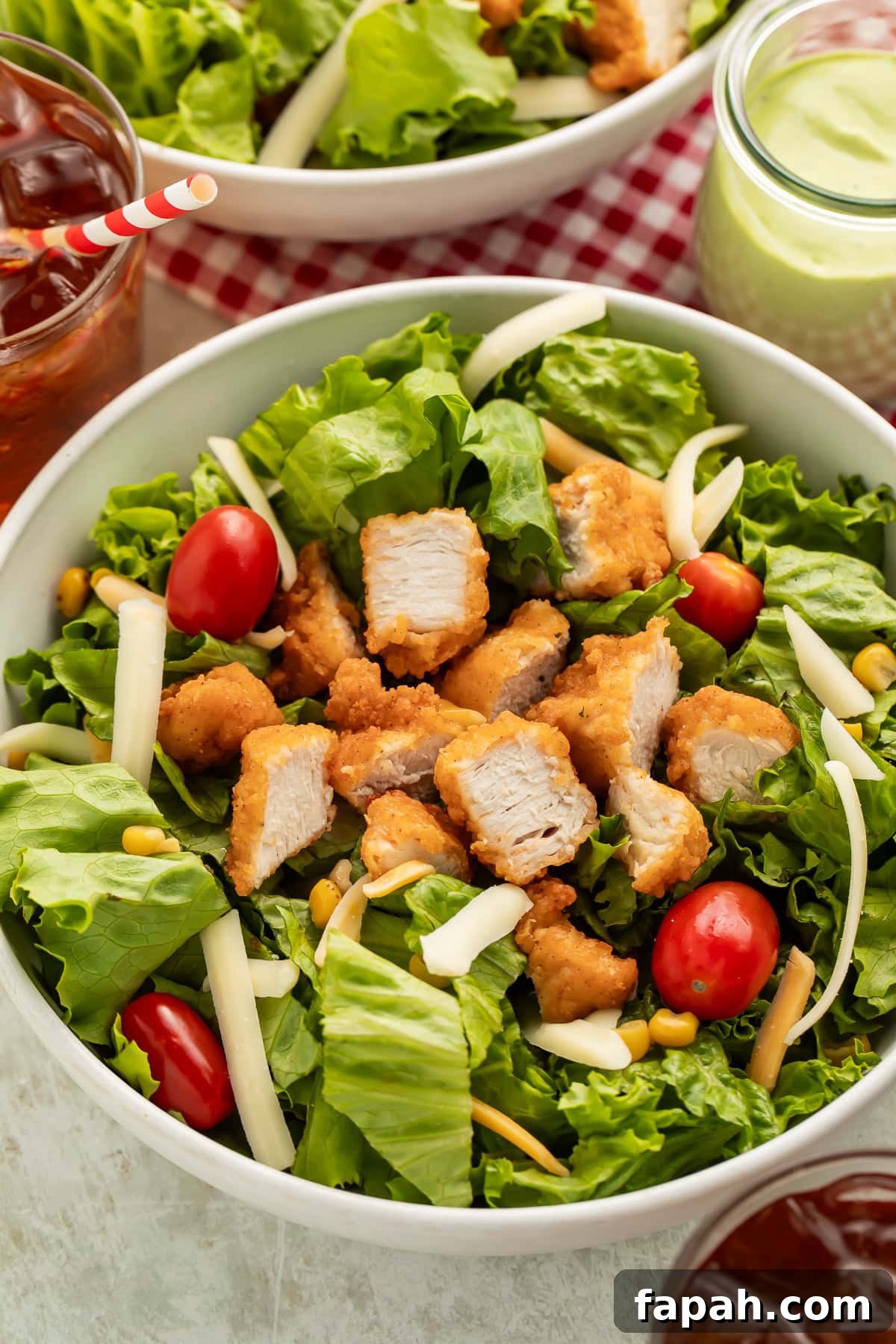 Chick-fil-A Cobb Salad Recipe: Classic Copycat Version 2 Chick-Fil-A cobb salad copycat in a bowl on a table.