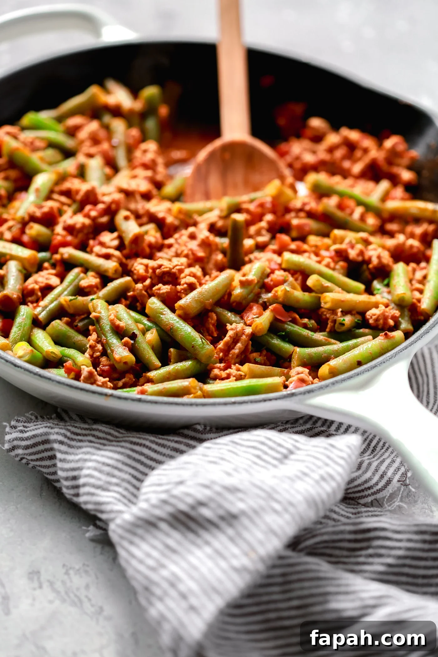 60 Delicious Whole30 Recipes for Every Meal and Snack 11 ground turkey with green beans in a cast iron skillet
