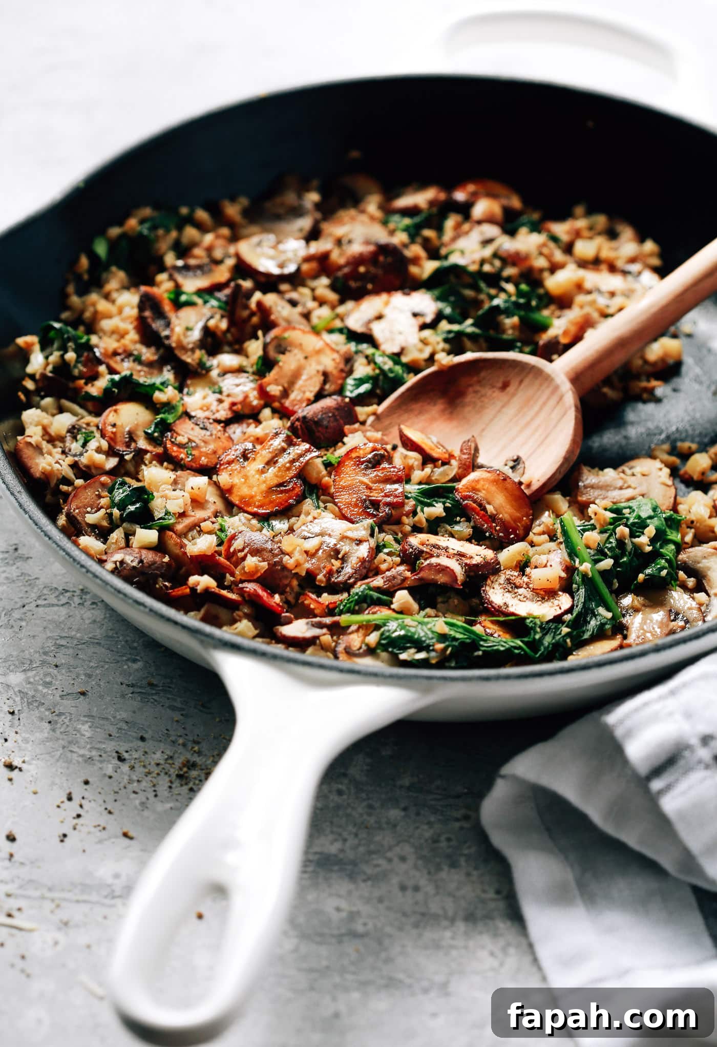 60 Delicious Whole30 Recipes for Every Meal and Snack 14 mushroom cauliflower in a cast iron skillet