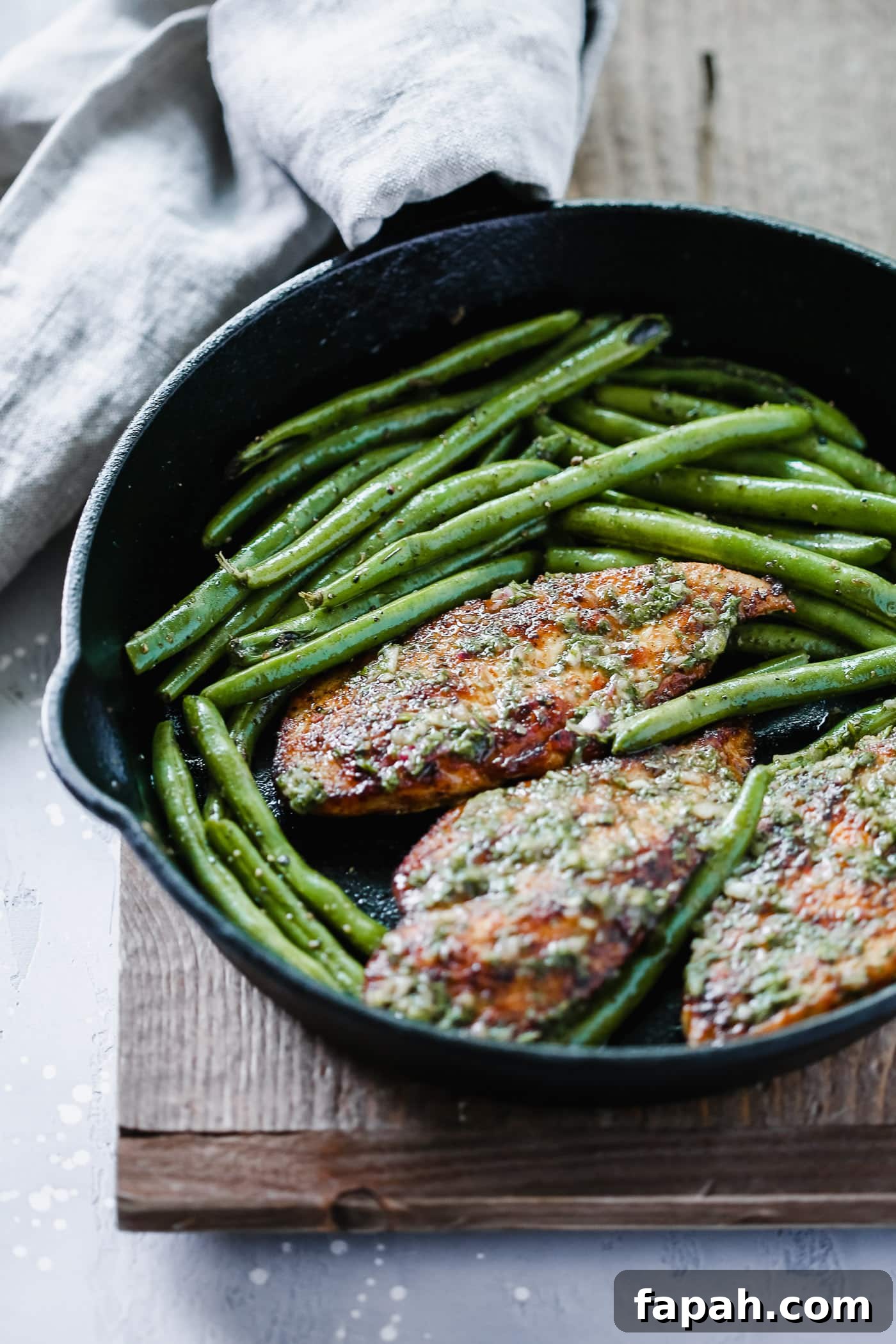 60 Delicious Whole30 Recipes for Every Meal and Snack 16 chicken breast and green beans in a cast iron skillet