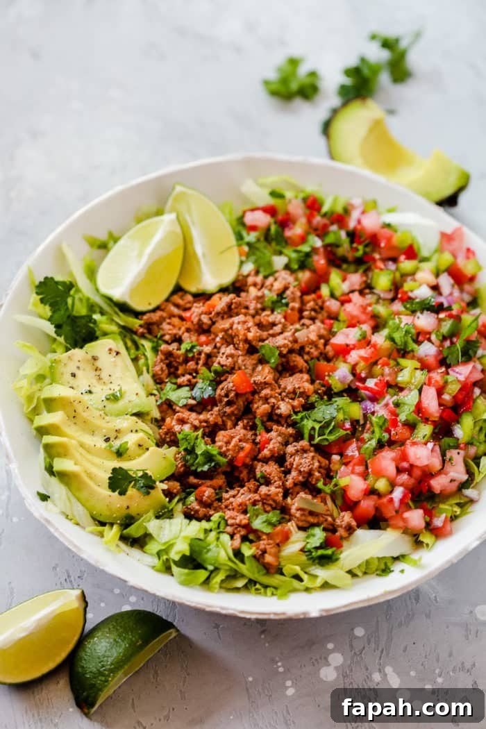 60 Delicious Whole30 Recipes for Every Meal and Snack 32 close-up view of a taco salad in a white bowl