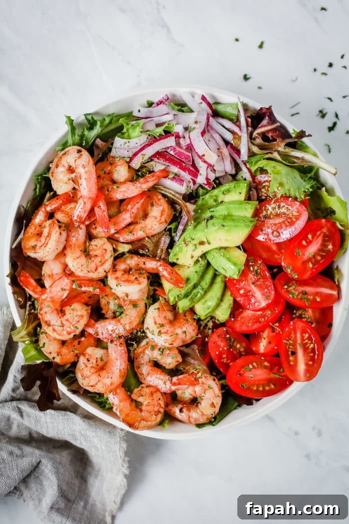 60 Delicious Whole30 Recipes for Every Meal and Snack 33 overhead view of shrimp salad in a white bowl