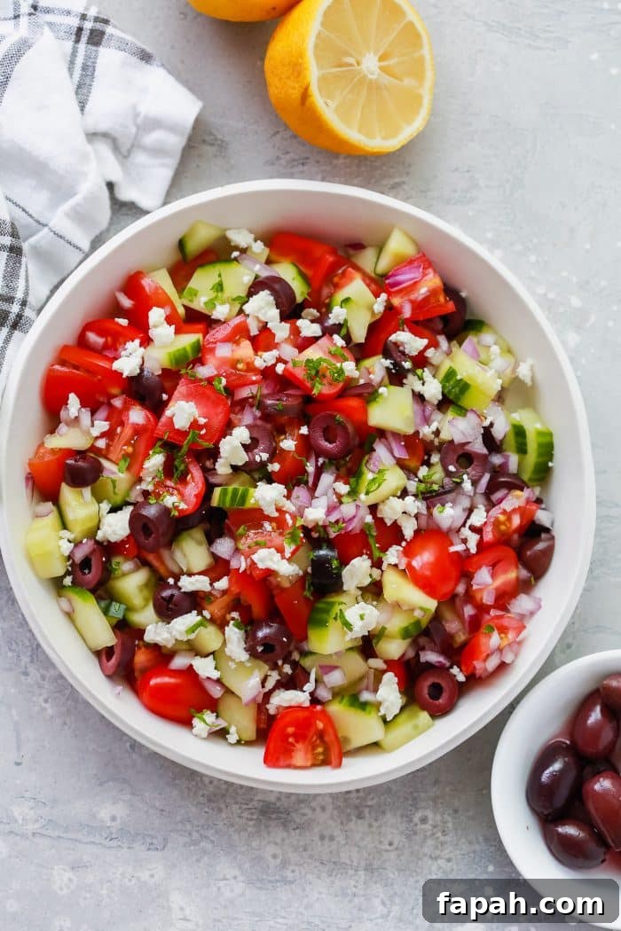 60 Delicious Whole30 Recipes for Every Meal and Snack 34 overhead view of greek salad in a white bowl