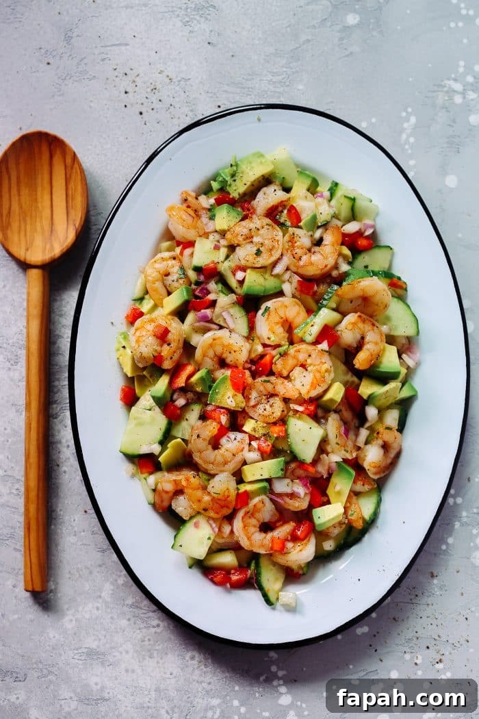 60 Delicious Whole30 Recipes for Every Meal and Snack 35 overhead view of shrimp salad on a white plate