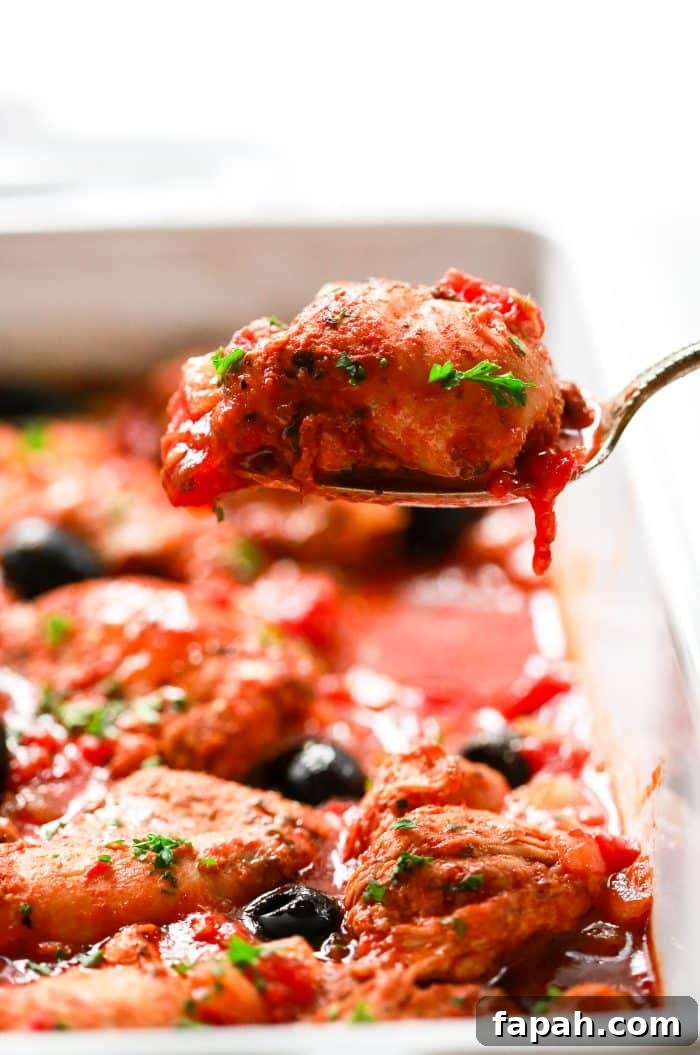 60 Delicious Whole30 Recipes for Every Meal and Snack 54 close-up of chicken thigh on a large serving spoon
