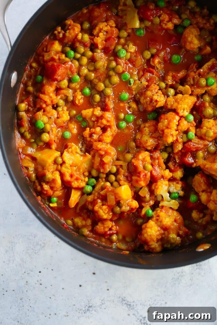 60 Delicious Whole30 Recipes for Every Meal and Snack 55 overhead view of cauliflower curry in a large pot