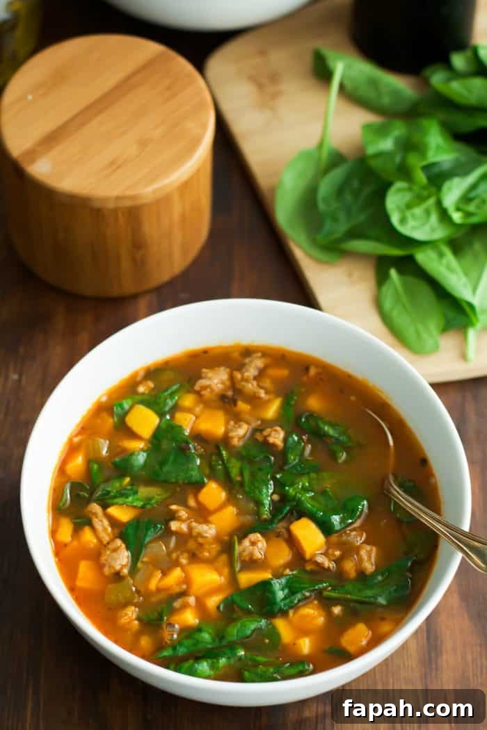 60 Delicious Whole30 Recipes for Every Meal and Snack 59 close-up of a sweet potato and spinach soup in a white bowl