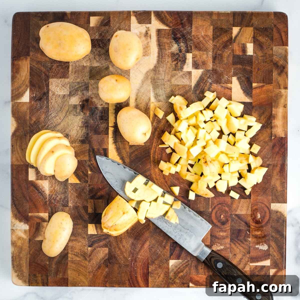 Showing how to dice yukon gold potatoes.