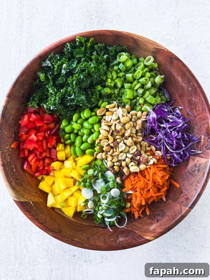 Chopped up vegetables in a bamboo serving bowl.