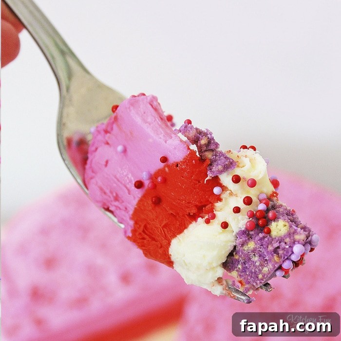 a fork with a bite of Valentine's cheesecake