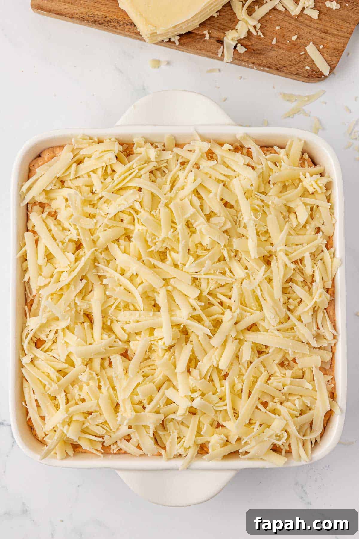 adding the cheese on top