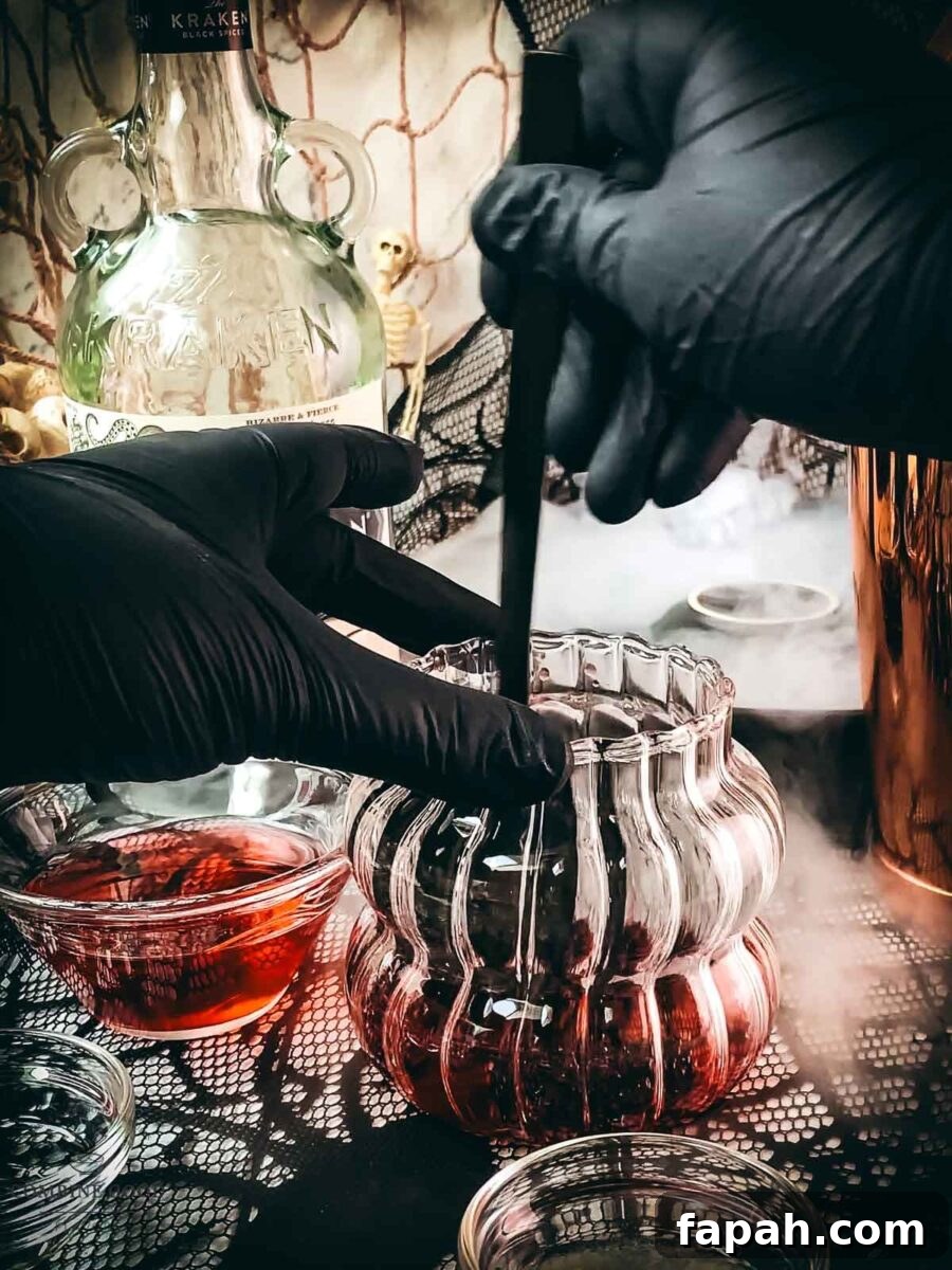 Muddle the cranberries in the serving glass.
