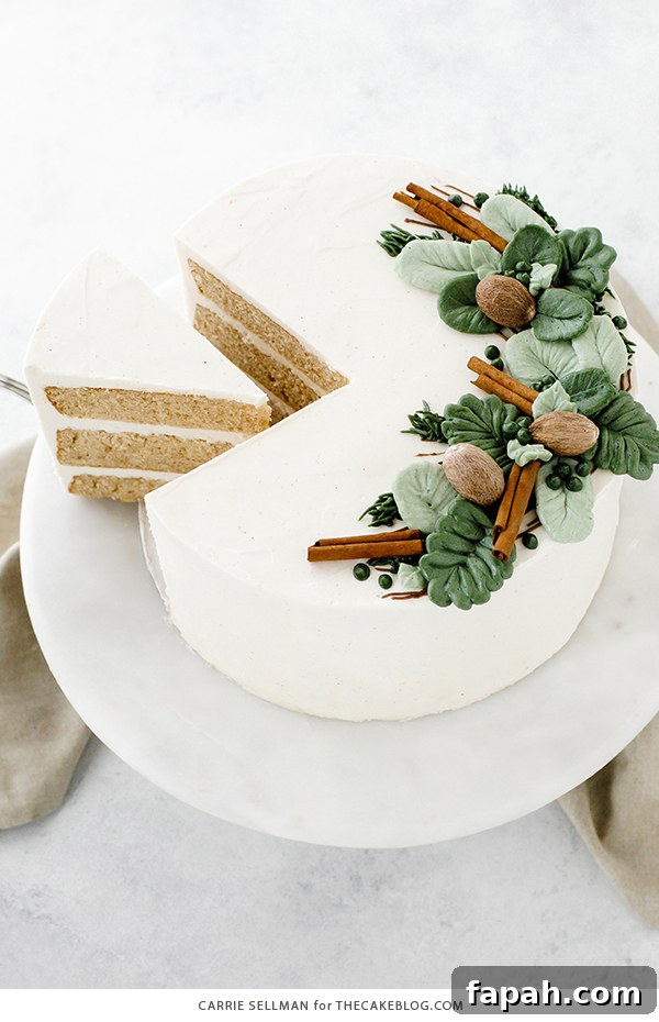 Decadent Eggnog Layer Cake with Spiced Rum Glaze 9 Eggnog Cake - a rich butter cake with hints of cinnamon and nutmeg, paired with a creamy eggnog buttercream | by Carrie Sellman for TheCakeBlog.com