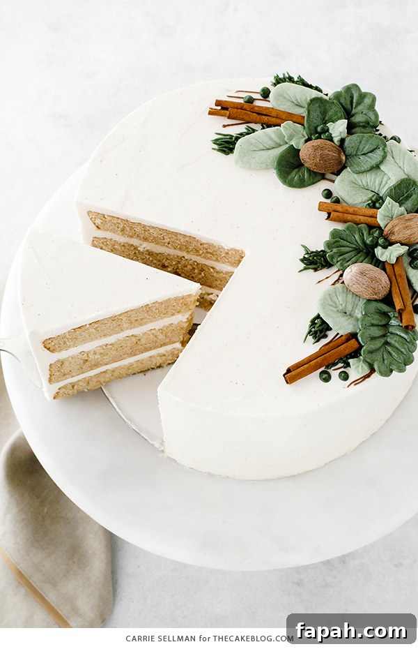 Decadent Eggnog Layer Cake with Spiced Rum Glaze 6 Eggnog Cake - a rich butter cake with hints of cinnamon and nutmeg, paired with a creamy eggnog buttercream | by Carrie Sellman for TheCakeBlog.com