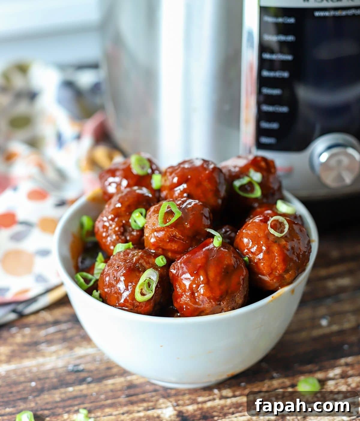 Instant Pot Grape Jelly Meatballs Recipe for Quick Weeknights 6 bowl of grape jelly meatballs.