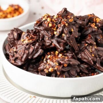 Round white bowl of Chilli Chocolate Clusters.