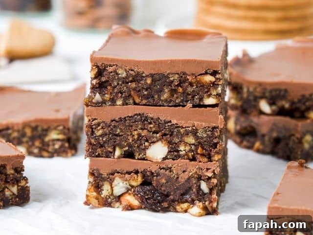 Stack of three tiffin pieces, with other pieces around the edge and in the background.