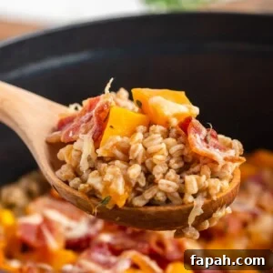 A wooden spoon with food on it