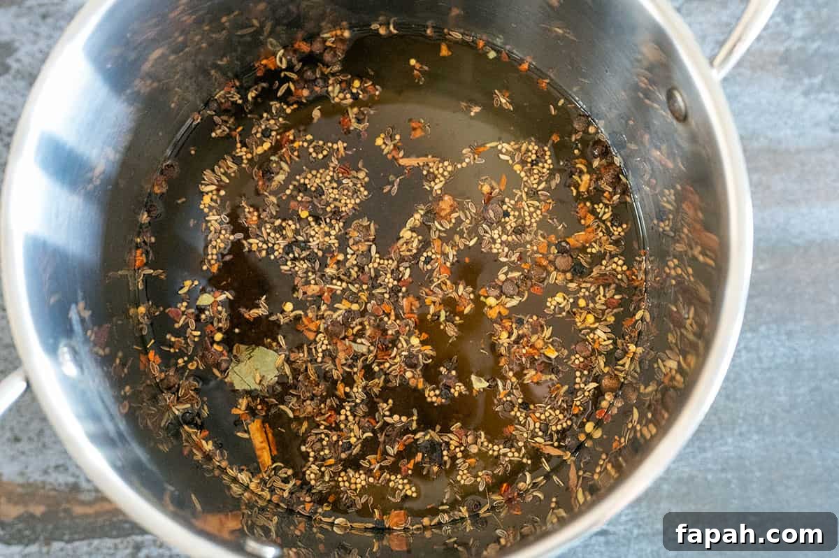 corn beef brine ingredients in large pot.