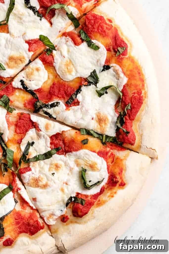 A close-up view of the pizza showing melted cheese.