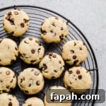 35 Gluten-Free Valentine’s Day Desserts to Delight Your Loved One 22 Chocolate chip cookies on a wire rack.