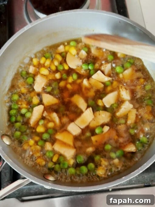 Adding sauce to frying pan