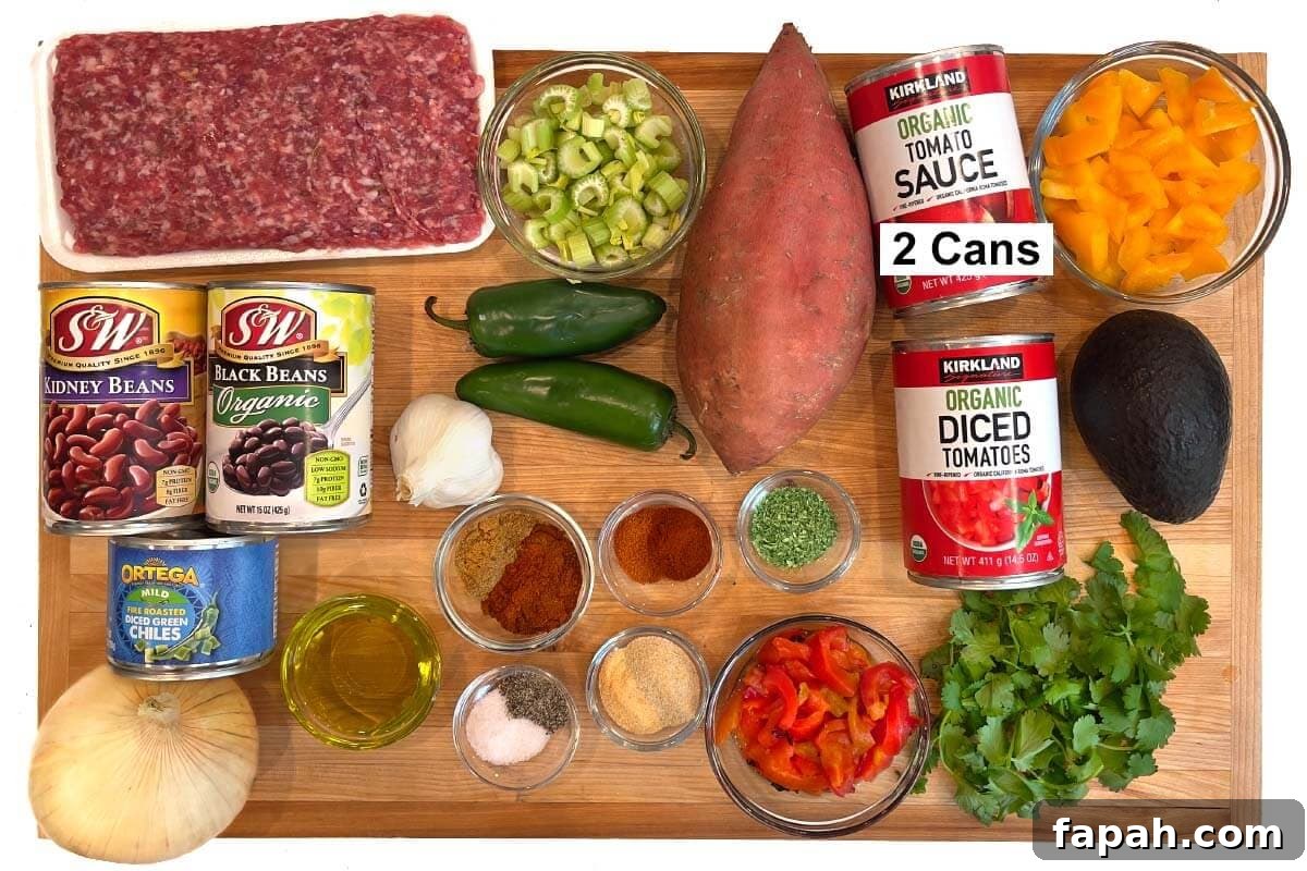 Sausage Sweet Potato Chili ingredients shot on board