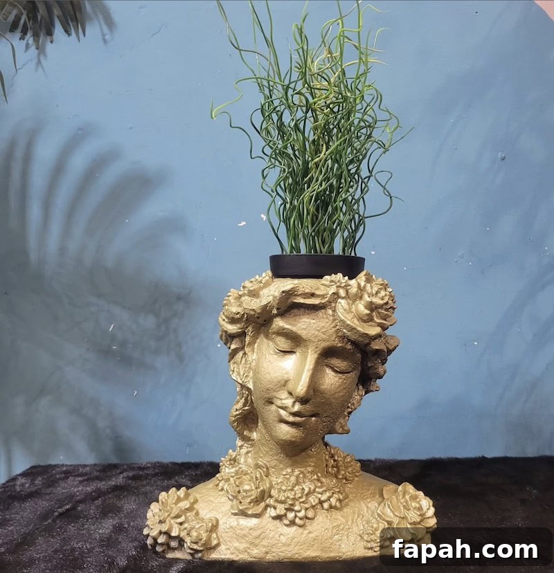 13 Striking Plants to Style Tall Planters with Impact 9 plant for head planters