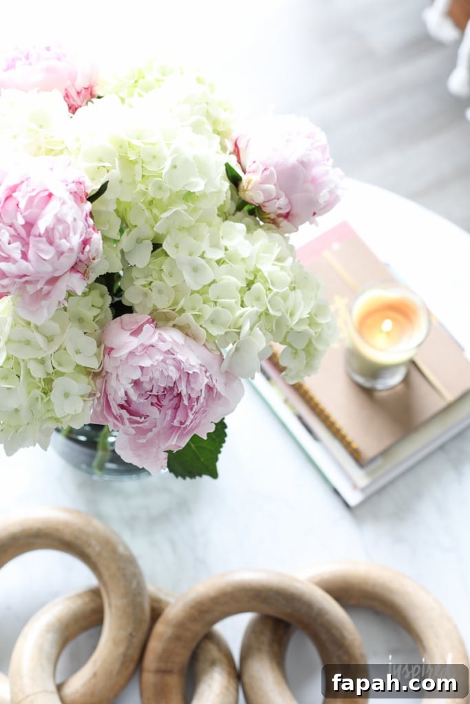 Complete Guide to Flower Arranging: Techniques, Tips & Styles 11 Peony Arrangement on coffee table.