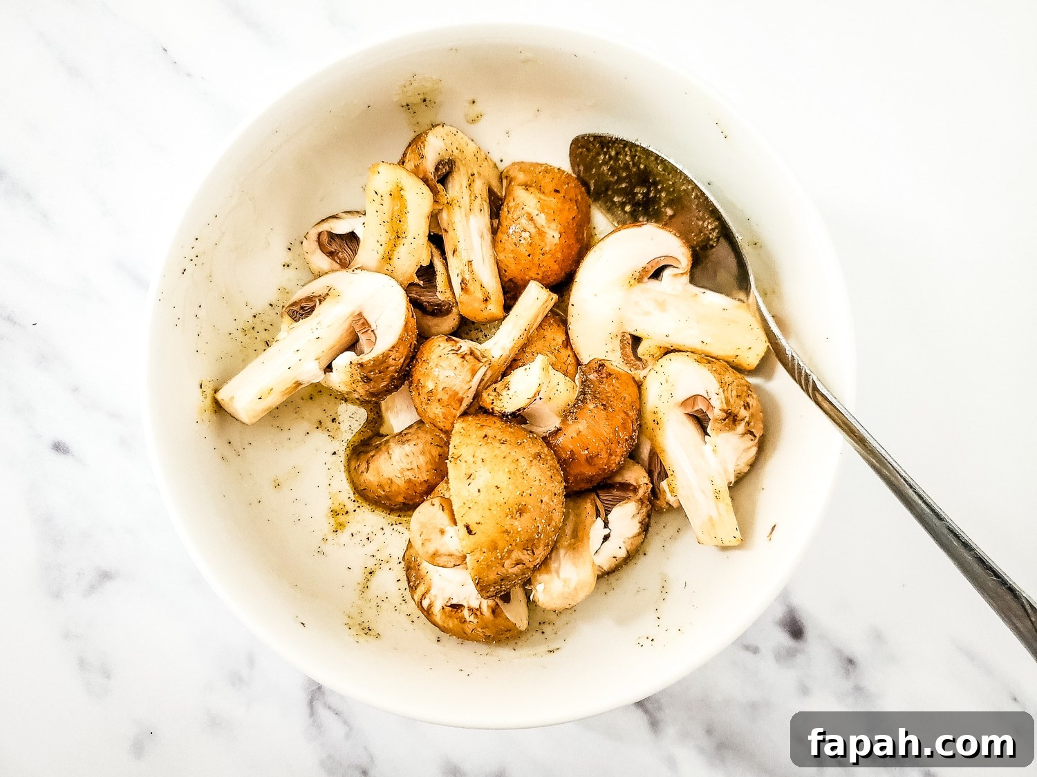 Air Fryer Garlic Mushrooms — Low‑Carb Side Dish 5 Bella mushrooms in a bowl with garlic