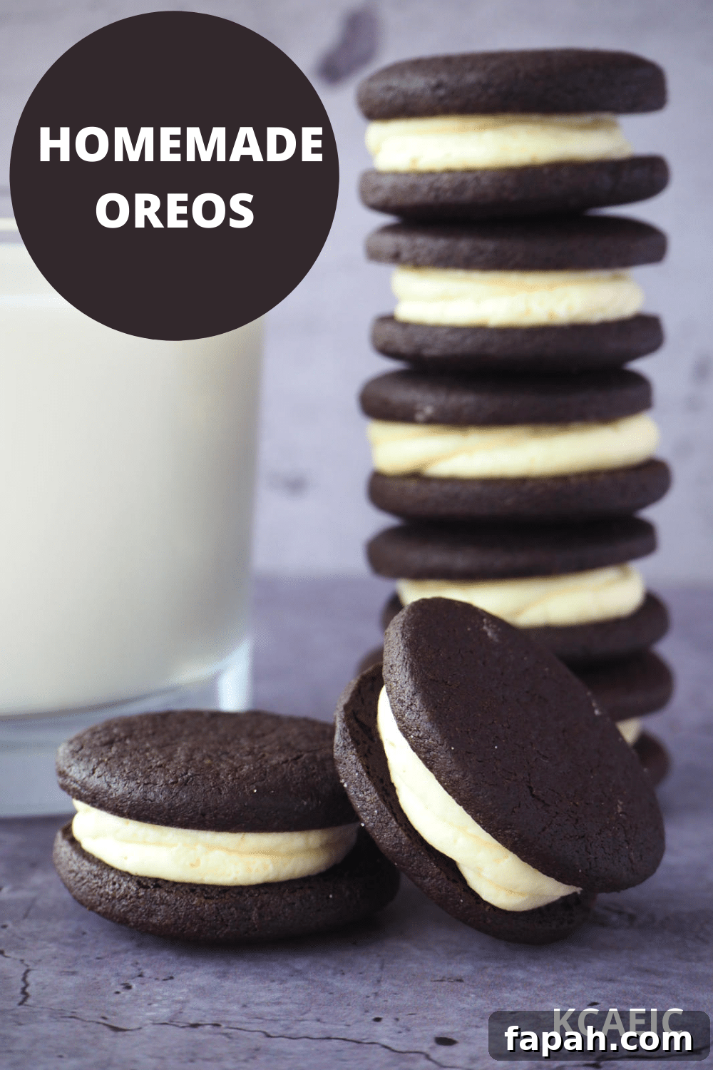 How to Make Homemade Oreo Cookies from Scratch 31 side view of stack of homemade oreos, with single oreo and one oreo propped on its side, with glass of milk and text overlay, homemade oreos and KCAEIC.