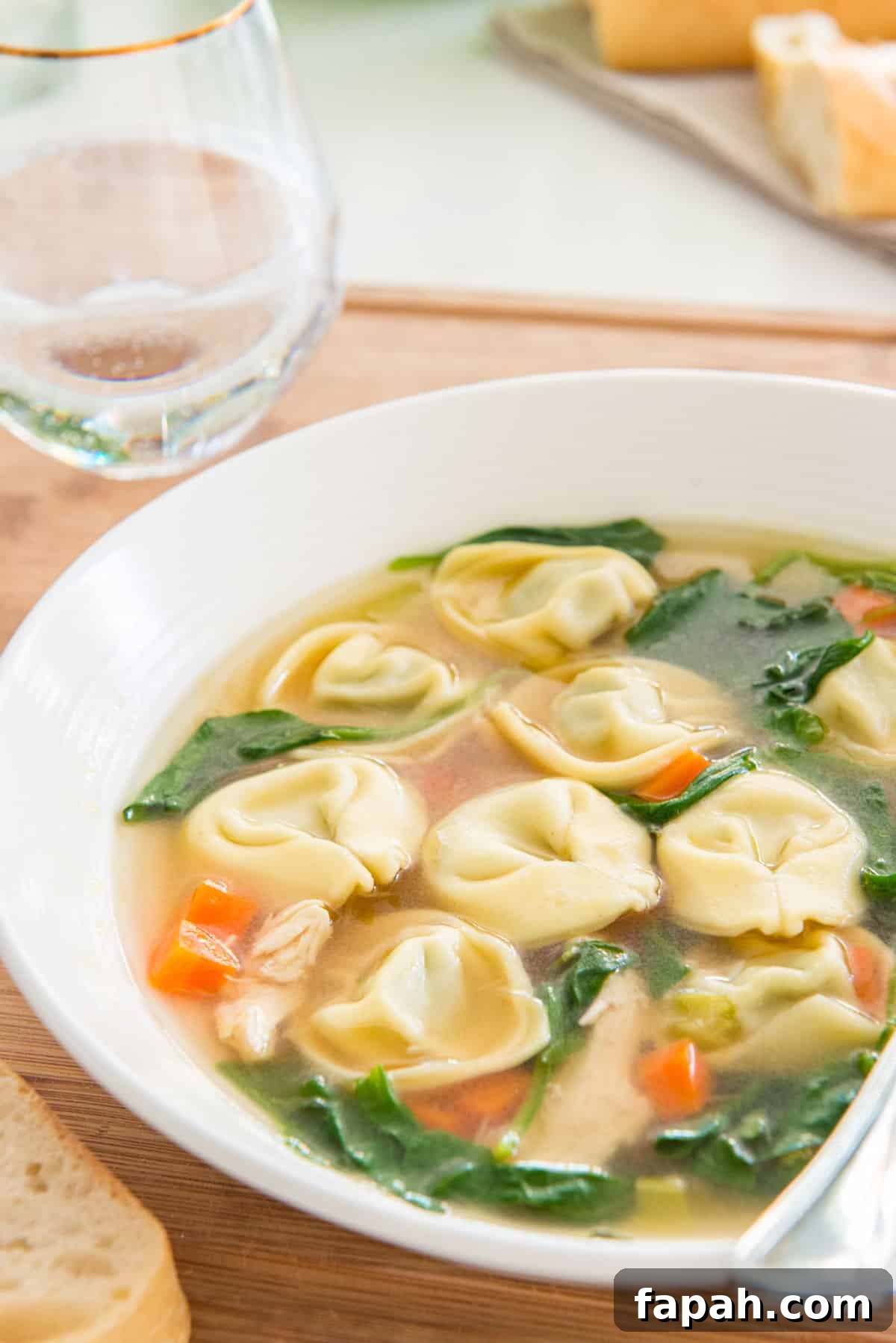 Creamy Spinach Tortellini Soup Recipe for Cozy Weeknights 2 Chicken Soup with Tortellini and Spinach in Bowl