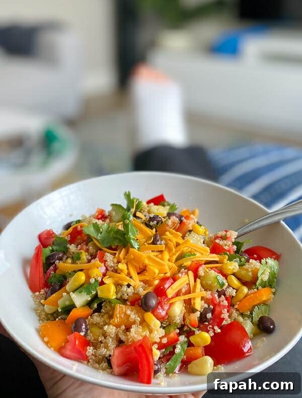 quinoa black bean salad on lap with leg in cast