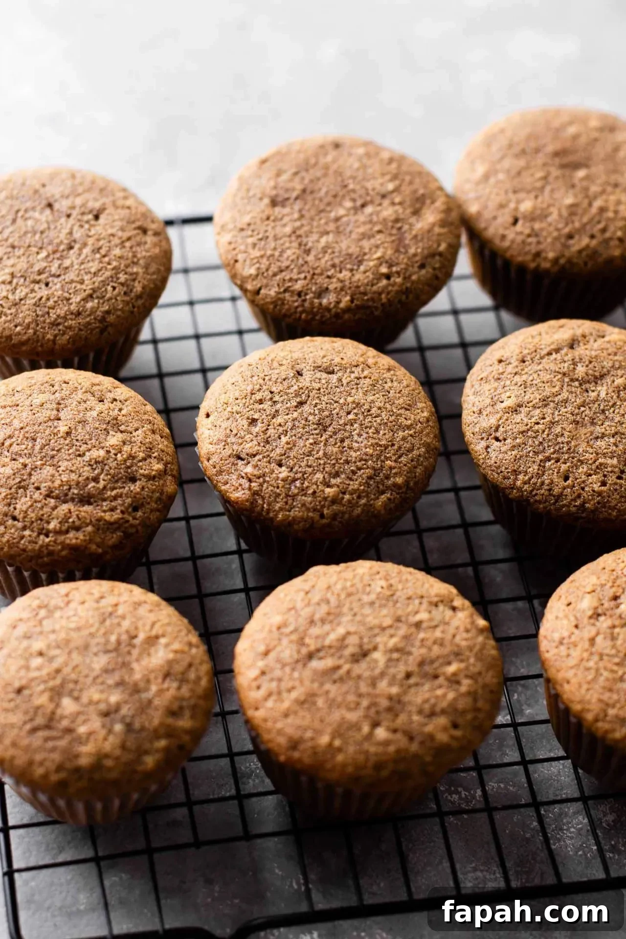baked tiramisu cupcakes on wire rack