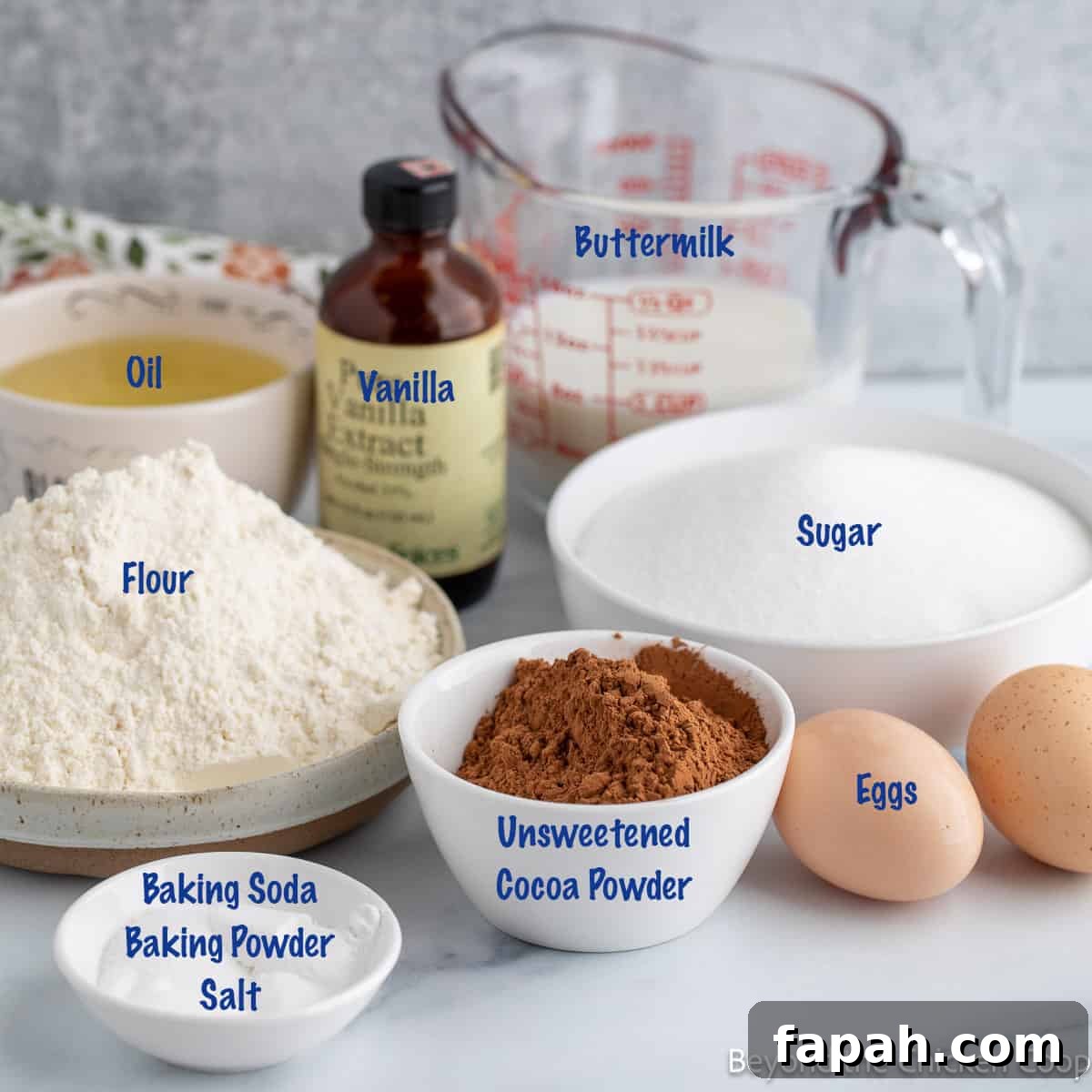 Moist Buttermilk Chocolate Cake Recipe for Rich Chocolate Flavor 3 Ingredients in small bowls for making a cake.