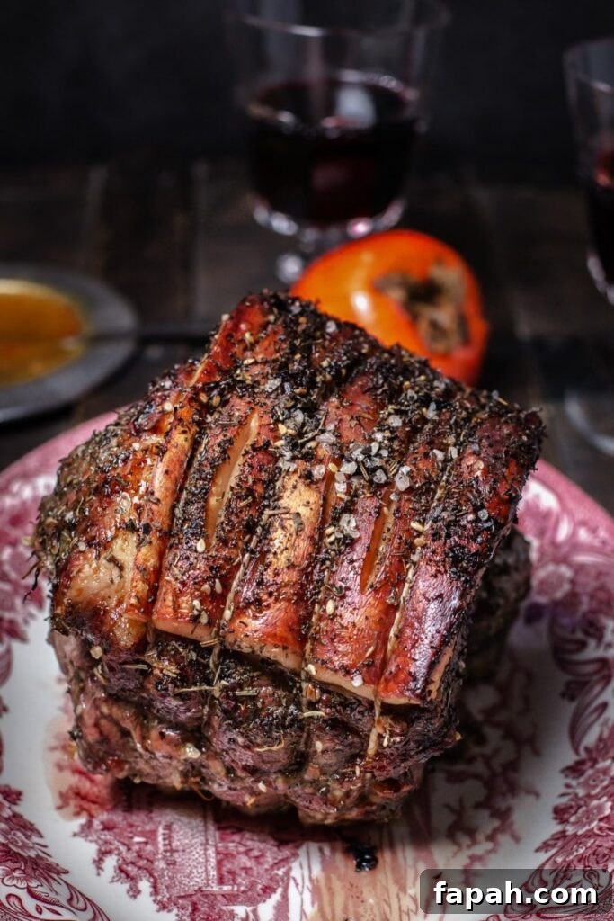 Cooked pork roast on a serving platter