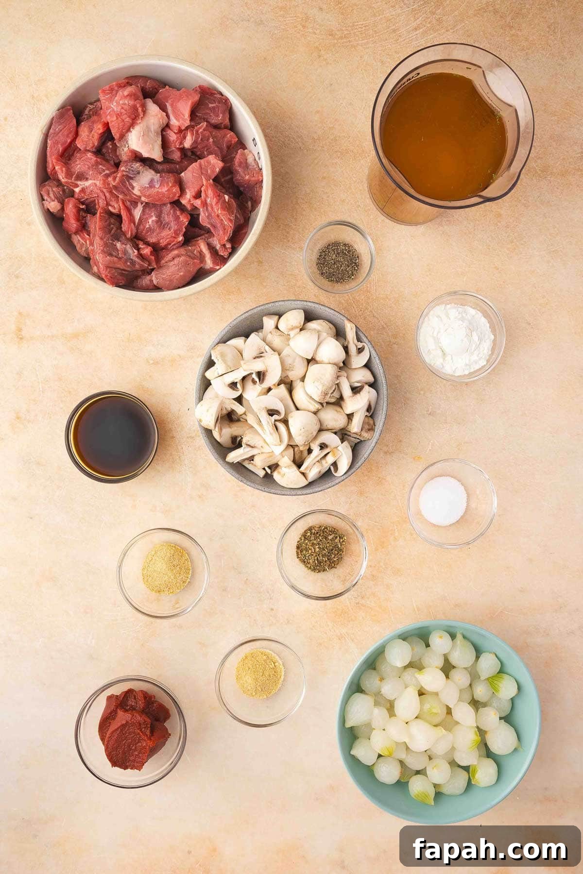 Ingredients needed to make a slow cooker beef tips and gravy recipe.