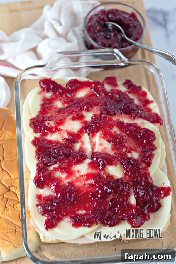 turkey cranberry sliders in a clear baking pan
