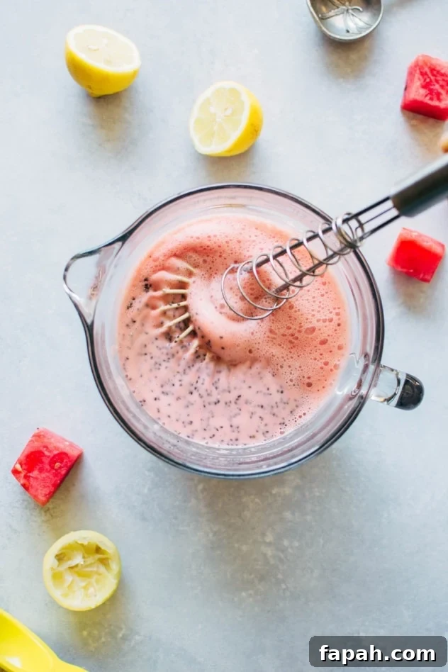 Creamy Watermelon Chia Pudding Recipe for Summer Refreshment 4 Whisking pudding base for creamy watermelon chia seed pudding. A simple and healthy treat made with minimal ingredients, and packed with juicy summertime flavor to keep you happy and healthy!