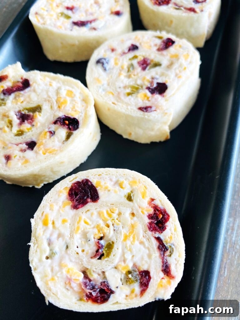 Spicy Jalapeño Cranberry Pinwheels — Party Appetizer Recipe 7 Jalapeno Cranberry Pinwheels