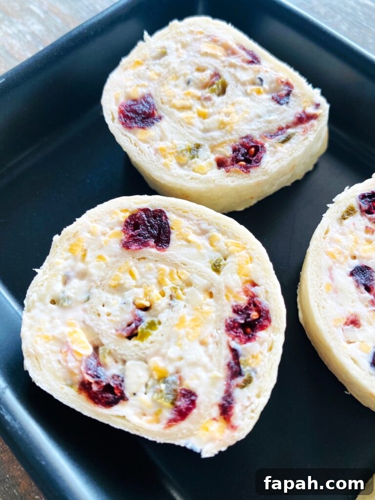 Spicy Jalapeño Cranberry Pinwheels — Party Appetizer Recipe 9 Jalapeno Cranberry Pinwheels