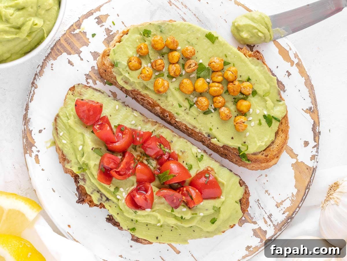 roasted chickpeas on toasted bread with avocado spread