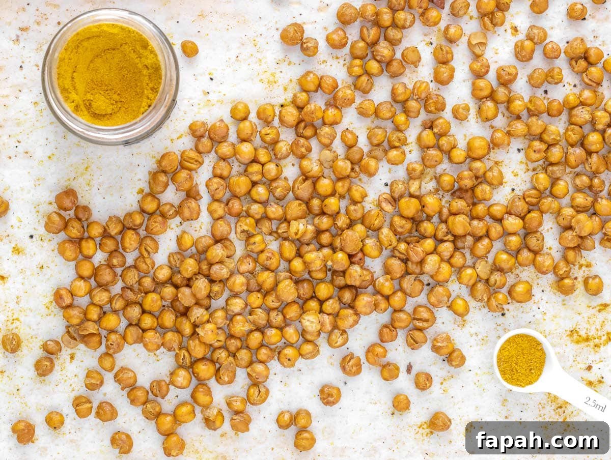 seasoning roasted chickpeas with curry powder