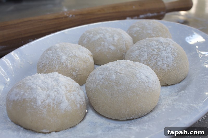 Dough portioned into 6 rounds