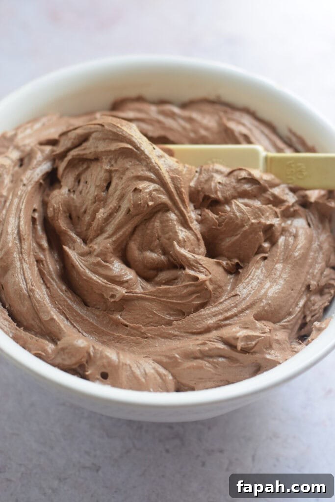 Chocolate frosting in a bowl.
