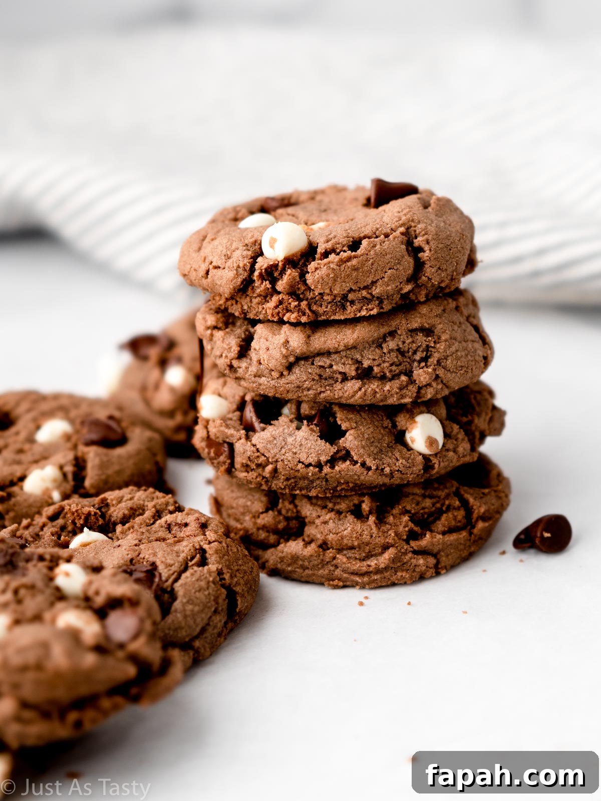 Triple Chocolate Chip Cookies — Gluten-Free Recipe 2 Stack of triple chocolate chip cookies.