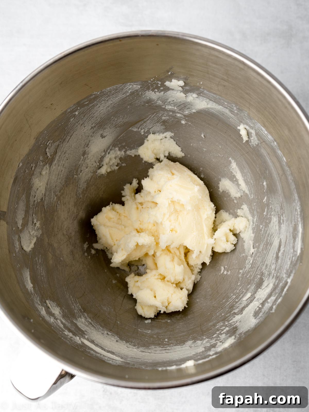 Triple Chocolate Chip Cookies — Gluten-Free Recipe 6 Creamed butter and sugar in a bowl.