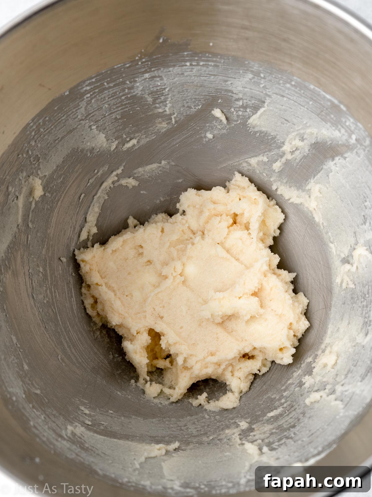 Triple Chocolate Chip Cookies — Gluten-Free Recipe 7 Wet ingredients in a bowl.